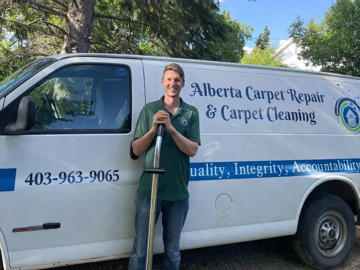 Andrew from Alberta Carpet Repair with his service van in Red Deer