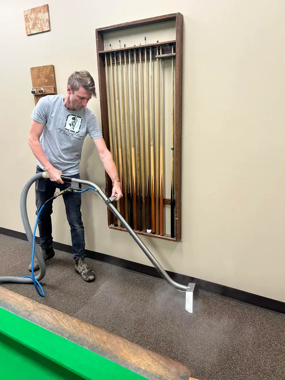 Andrew of Alberta Carpet Repair working on a carpet job in a Central Alberta home